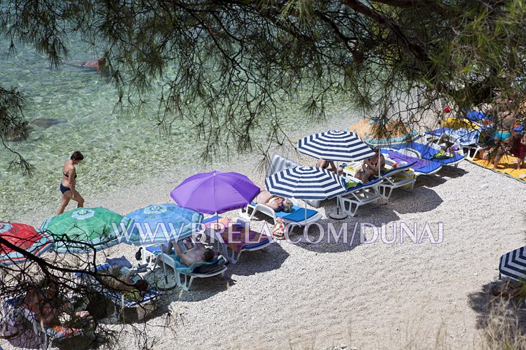 Sun umbrella on beach in Brela